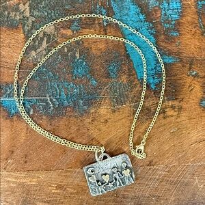 Jes MaHarry “Grateful” Sterling Silver and gold charm on gold chain.